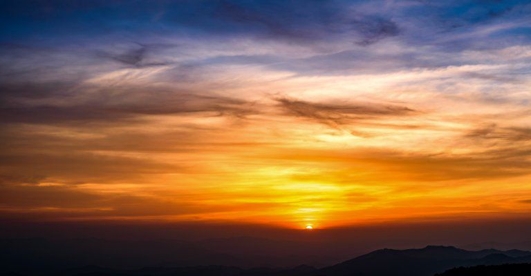 About Conscious Living-distant sunset